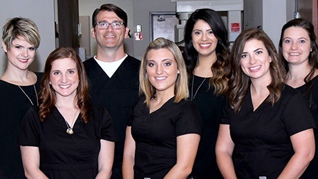 The Colony dentist and team members smiling