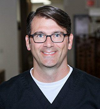Headshot of the Colony Dentist Dr. Austin Amos