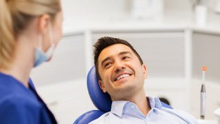 Man smiling in the dental chair