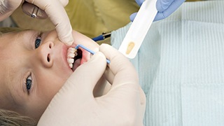 child receiving dental examination