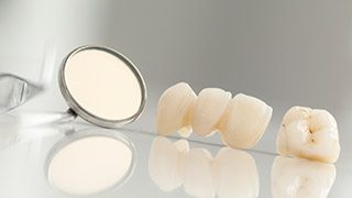 The Colony General Dentistry dental mirror on table