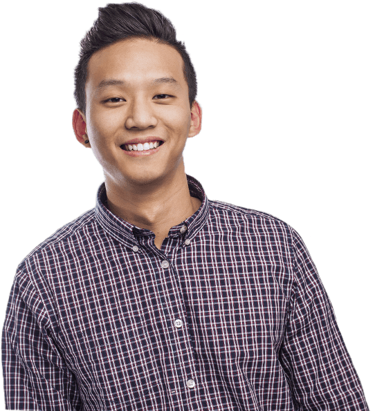 Young man in plaid shirt smiling