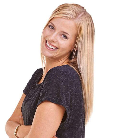 Young blonde woman in black shirt smiling