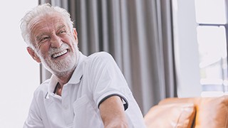 Man smiling with dentures