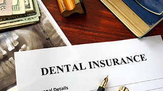 dental insurance paperwork for the cost of dental emergencies in the Colony