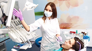 Relaxed man receiving dental treatment