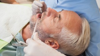 The Colony Sedation Dentist relaxed lady receiving procedure