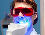 Man wearing protective glasses smiling