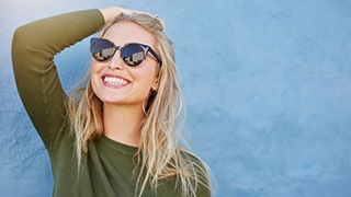 smiling young woman with white teeth 