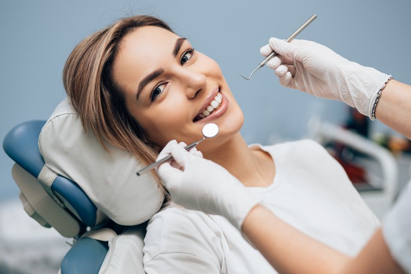 A young woman receiving cosmetic dental treatment