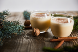 a closeup of eggnog and walnuts 