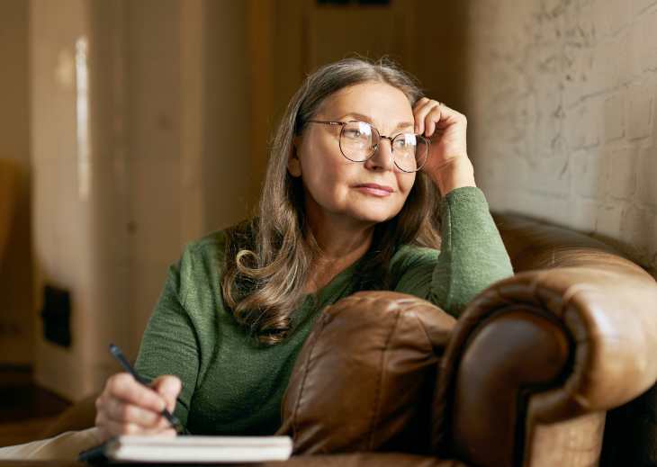 Older woman looking thoughtful