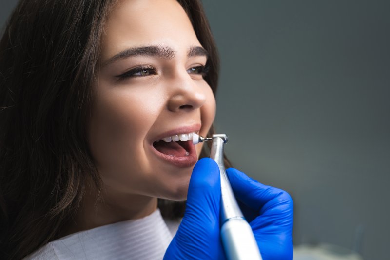 woman having her teeth cleaned